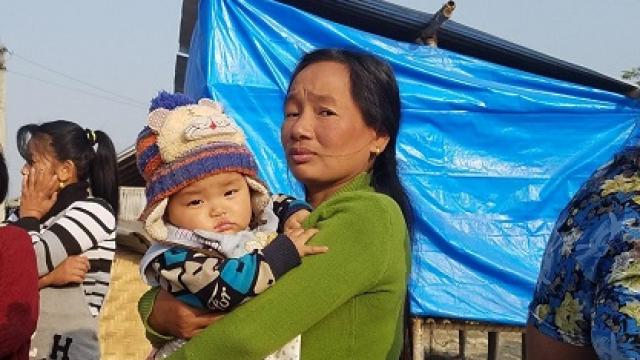 woman holding baby